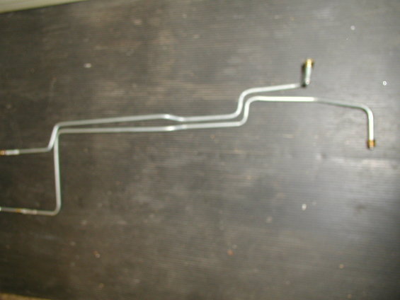 p8210792.jpg New transmission cooler lines fabricated from 3/8" brake line. 