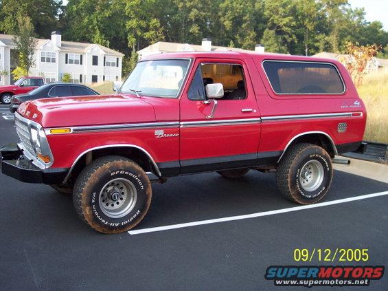 Red 1979 Ford Bronco parked in a lot