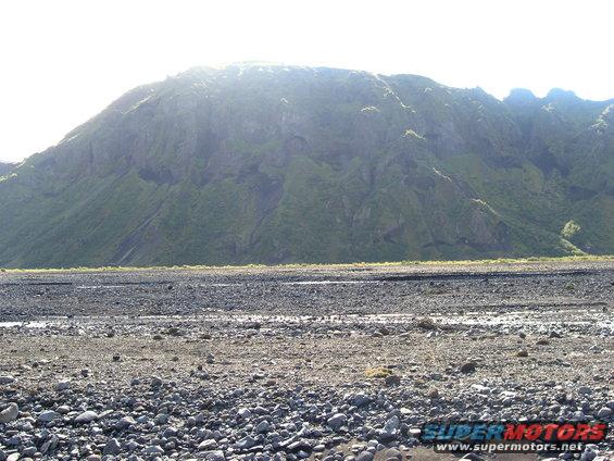 Rocky riverbed and mountain landscape