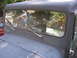 1973 Jeep CJ5 - Front view of a 1973 Jeep CJ5, showing the windshield with an inspection sticker and wipers.