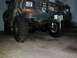 1979 Ford Bronco - Front view of a modified 1979 Ford Bronco with off-road tires and a winch installed.