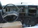 1983 Ford F-250 - Dashboard and interior of a truck, showing the steering wheel, gauges, and a disassembled radio area.