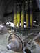 1983 Ford F-250 - Rear suspension components, including leaf springs and shock absorbers, are visible in this close-up.