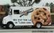 2005 BMW 3 Series - This Entenmann's truck features a large cookie graphic and a humorous slogan on its side.