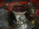 1986 Ford Mustang - Engine bay detail with V8 engine components visible, including air cleaner and distributor.