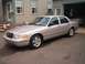 2003 Ford Crown Victoria - 04/17/04 Paul's house, finished up the cosmetics. Black slotted grill, black bumper strips, Marauder rear fascia, black…