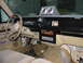 1985 Ford Crown Victoria LTD - Interior view of a 1985 Ford Crown Victoria LTD, a dashboard with added gauges.
