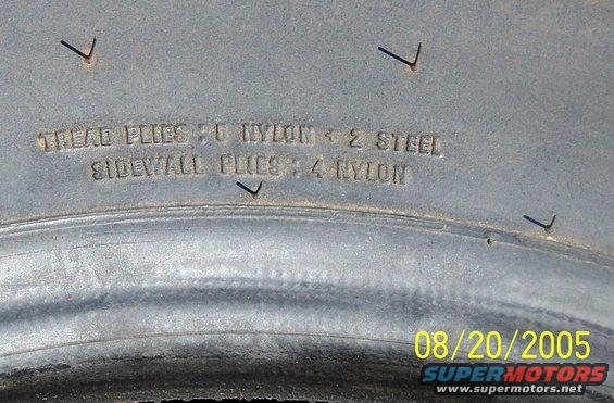Tire sidewall showing 'TREAD PLIES: 6 NYLON + 2 STEEL SIDEWALL PLIES: 4 NYLON' and date stamp 08/20/2005