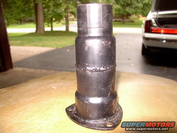 This is an old one I had left over from the Bronco, I'll be using. The $3 JC Whitney collector ring is welded to a 3" to 2 1/2" reducer ($3), which is welded to a 2 1/2" to 2 1/4" reducer ( $2), etc, etc until you're where you want to be (fairly efficiently as far as flow goes too).