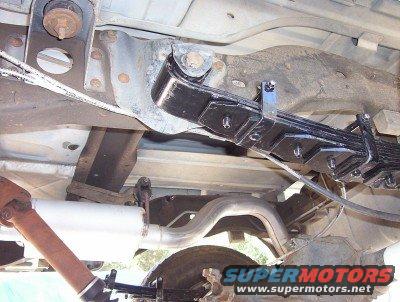 Undercarriage view of leaf springs and exhaust system