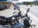 1981 Honda CB750 - Several motorcycles are parked along the side of a road in front of the El Paraiso Restaurant.