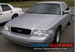Silver 2002 Ford Crown Victoria front view, another Crown Victoria behind it