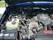 1995 Ford C-350 (Centurion Conversions) - Close-up view of the engine compartment, highlighting the turbo diesel engine and associated components.