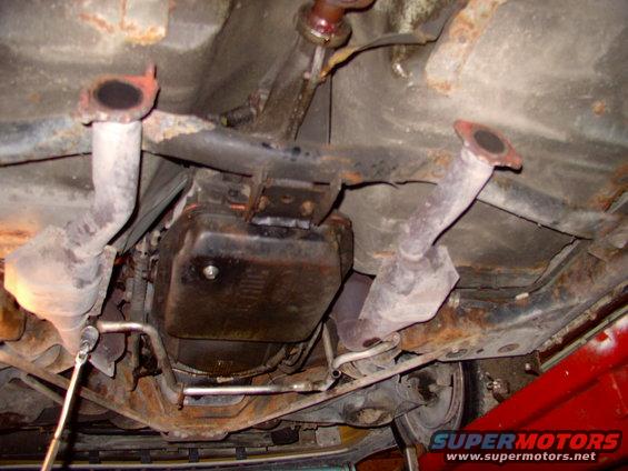 Why not stick with dual 1 7/8" pipes ? 1.) too small 2.) no crossover pipe 3.)duals promote horsepower, not torque 4.) better mileage with single system 5.) cost 6.) simplicity 7.) previous experiance with similar Y-pipe, etc, etc,etc.