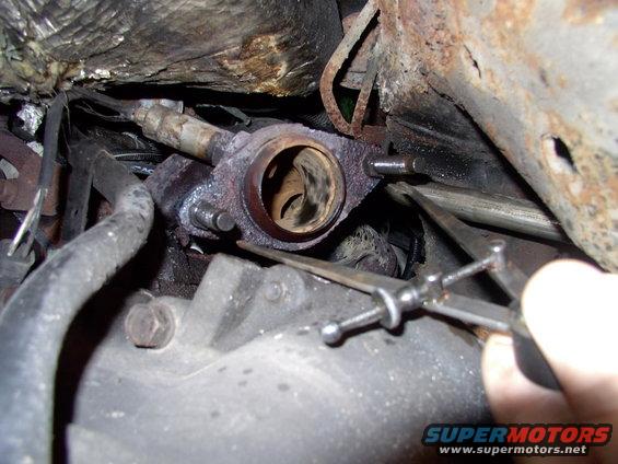 img_0039.jpg New studs back into the manifolds. The calipers told us that the passenger manifold side stud centers are considerably wider than the driver's side 3 3/4".