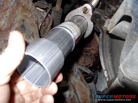 This was my idea to get us from the 2" headpipe flares back out to 2 1/4" pipe to head for the Flowmaster Y collector with. My pipe bending buddy had a better idea......