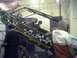 2005 BMW 3 Series - A custom-built vehicle with John Deere branding is displayed indoors.