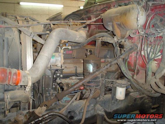 Engine compartment with large hoses and engine components