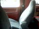 1992 Ford F-150 - Interior view of truck seats and door panel, showing the passenger seat and part of the driver's seat.