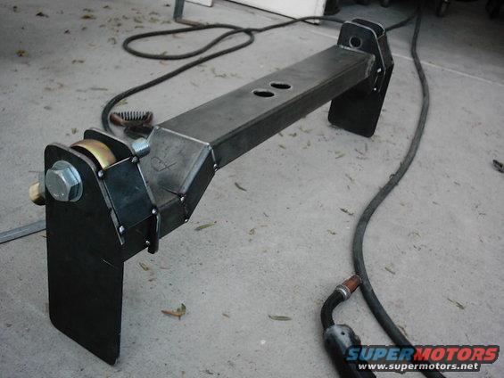 Custom trailer hitch receiver with large bolt and metal plates