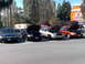 1999 Ford Crown Victoria - Four Ford Crown Victoria police interceptors are parked with their hoods open, possibly at a meet or event.