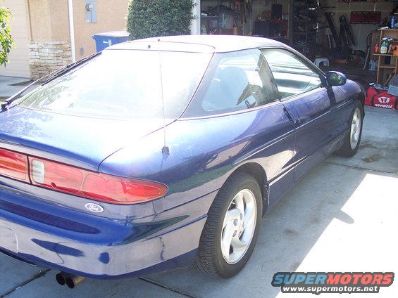 Blue 1995 Ford Probe rear 3/4 view