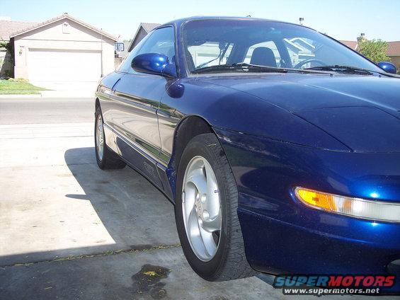 Blue 1995 Ford Probe parked in driveway