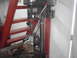 1978 Ford Bronco - A drill press is shown in a workshop setting, with a red ladder visible behind it.