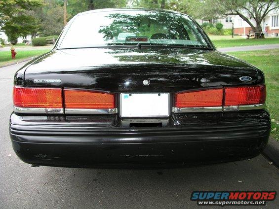 Black 1997 Ford Crown Victoria rear view, showing taillights and bumper
