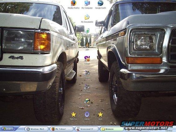 Two 1978 Ford Broncos parked head-to-head, showing front quarter panels and tires