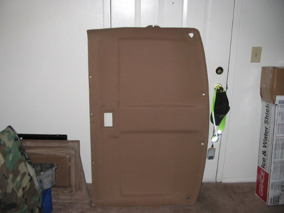 Brown door panel with a rectangular cutout