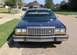 1985 Ford Crown Victoria LTD - This 1985 Ford Crown Victoria LTD is captured from a front-facing perspective on a sunny day.