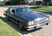 1985 Ford Crown Victoria LTD - This 1985 Ford Crown Victoria LTD is parked on a suburban street.