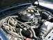 1985 Ford Crown Victoria LTD - The engine bay of a 1985 Ford Crown Victoria LTD, showing the V8 engine and associated components.