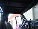 1992 Ford Bronco - Interior view of a vehicle, highlighting the rollcage structure and dashboard details.
