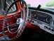 1966 Ford F-250 - The dashboard of a classic truck features a column-mounted shifter and a full array of gauges.