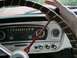 1966 Ford F-250 - The interior of a 1966 Ford F-250 shows the dashboard with its speedometer, oil gauge, and various switches.
