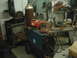1978 Ford Bronco - Workshop scene with welding equipment, gas cylinder, and tools visible.