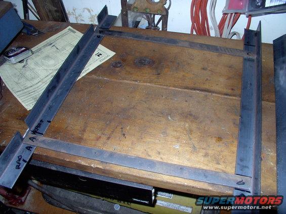 I just laid out some angle steel and some flat strap steel to tie it together, on the bench.