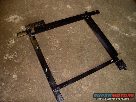 Finished, painted adaption frame for the Taurus fan. It will accept a stock Taurus fan, in the dark, at 2:00 a.m. by spinning off and on 4 nuts. It also bolts onto or off the Lincoln in one minute, with just 2 top mounted bolts.