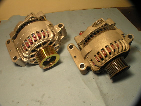 p9290061.jpg New alternator (left) and old alternator (right).