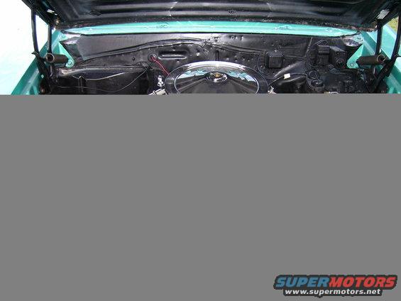 Teal 1967 Pontiac Lemans engine bay with chrome air cleaner and visible wiring