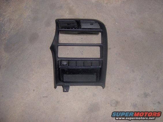 Black dashboard trim with air vents and buttons