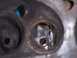 1967 Ford Mustang - This is a close-up view of an engine's cylinder head, revealing internal components and some wear.
