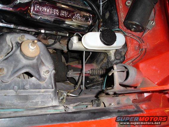pic5.jpg The new master cylinder.  It puts the brake lines a bit close to the valve covers, because the ports are on right side, but it works just fine.  New brake lines had to be plummed in.  The pedal feel is great, not stiff, not soggy, it's just right.  I love this new brake system.