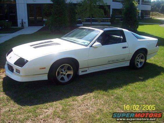 White 1988 Chevrolet Camaro IROC-Z parked on grass