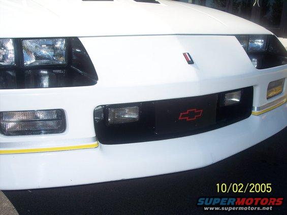 1988 Chevrolet Camaro front end with black grille and red bowtie emblem
