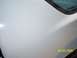 1988 Chevrolet Camaro - A close-up of a white car's hood and windshield edge, with a date watermark.