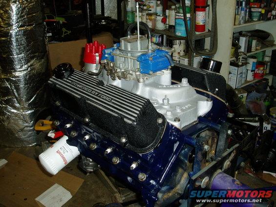 Ford V8 engine with "POWERED BY FORD" valve covers and a Motorcraft oil filter