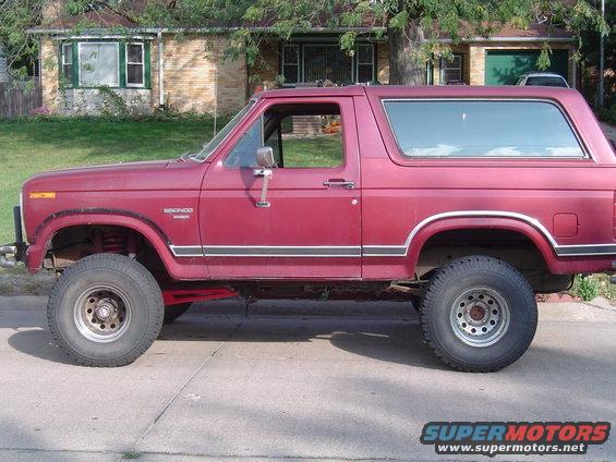 Red 1986 Ford Bronco side view
